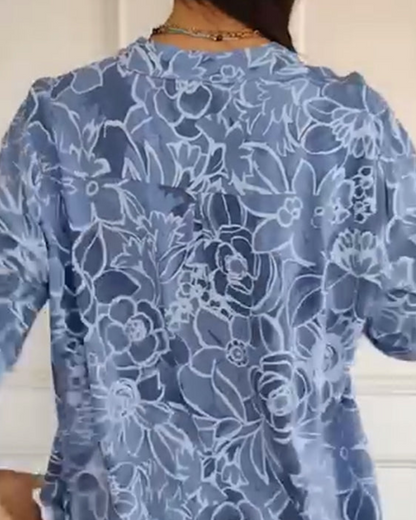 Kélya | Blusa amplia con estampado floral y detalles brillantes